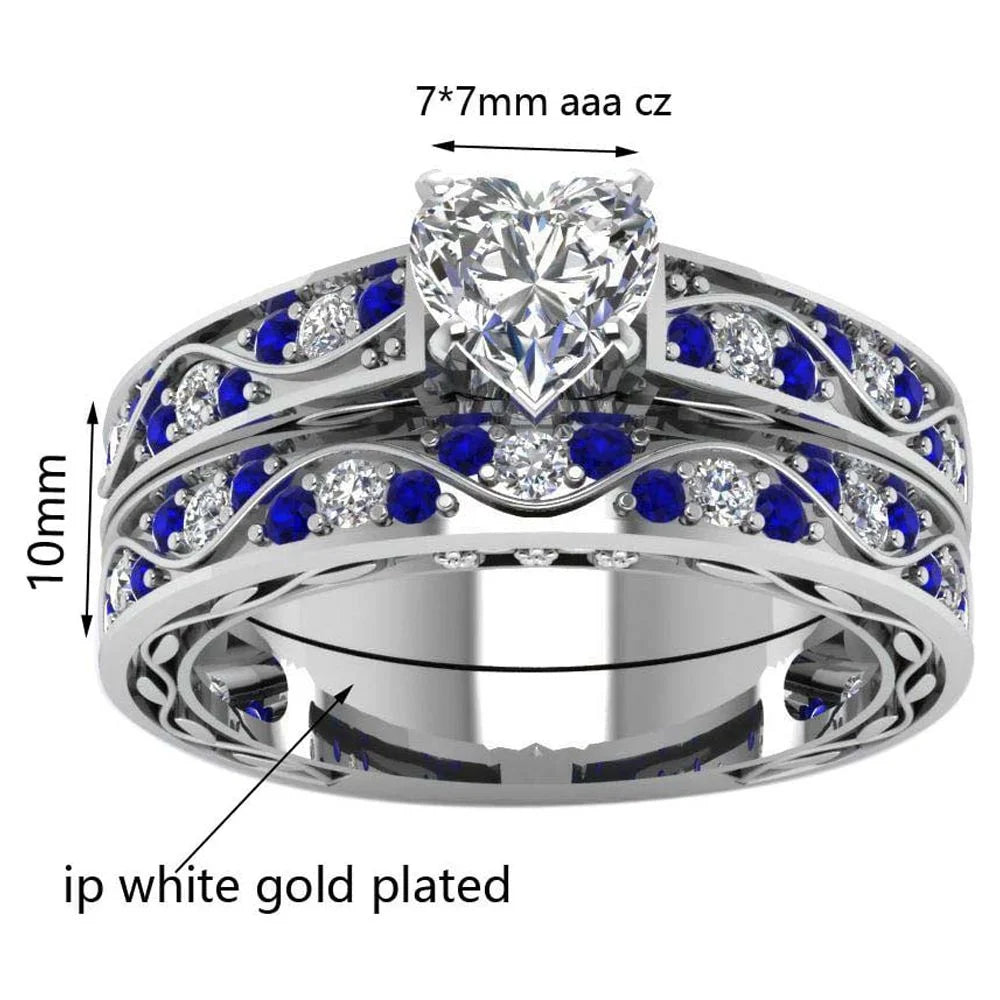 2 Matching Rings Set – White Gold Plated Heart-Shaped CZ Women’s Wedding Rings &amp; Blue Plated Tungsten Men’s Band