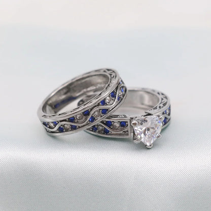 2 Matching Rings Set – White Gold Plated Heart-Shaped CZ Women’s Wedding Rings &amp; Blue Plated Tungsten Men’s Band