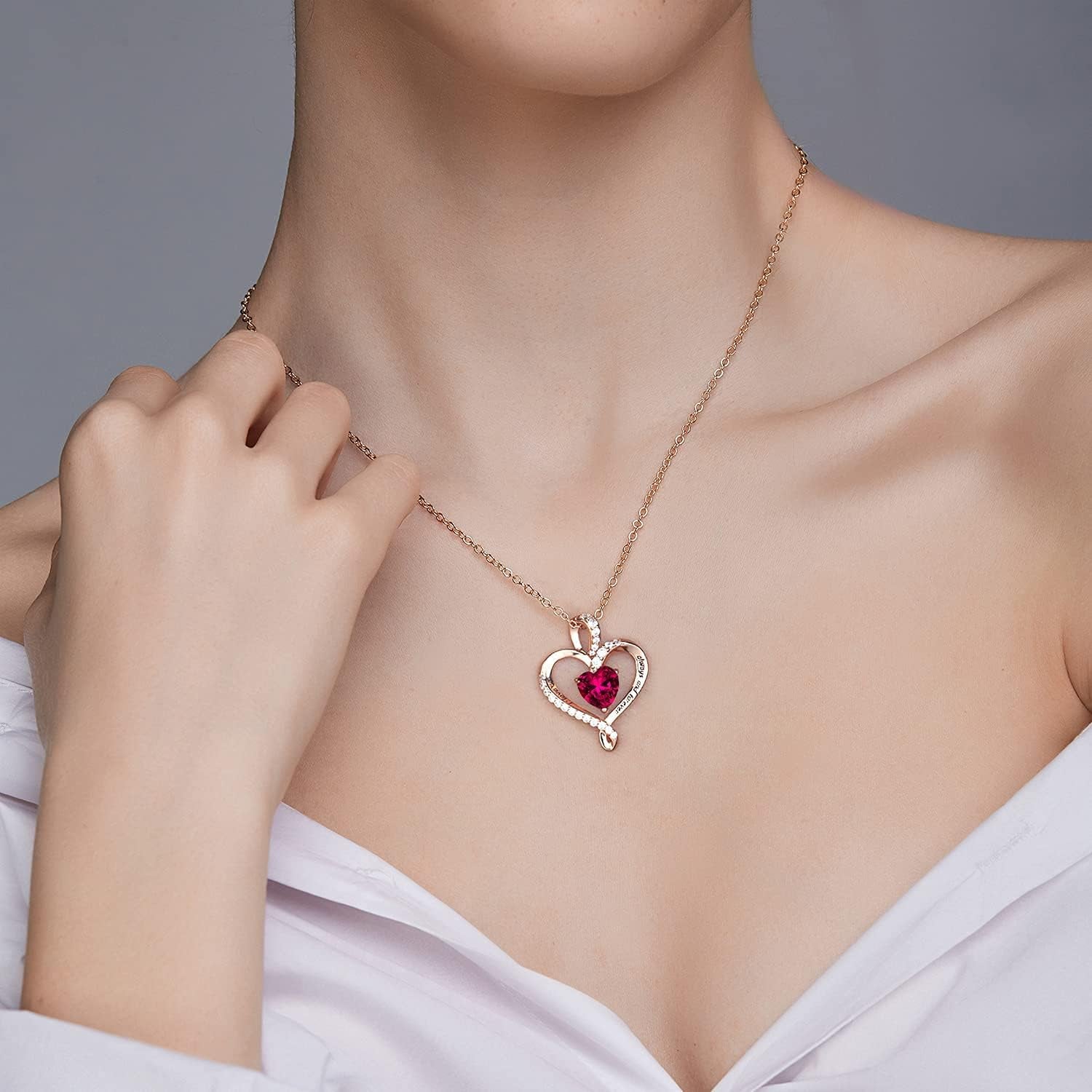 A timeless heart necklace with personalized birthstone sparkle—crafted for love and lasting memories.